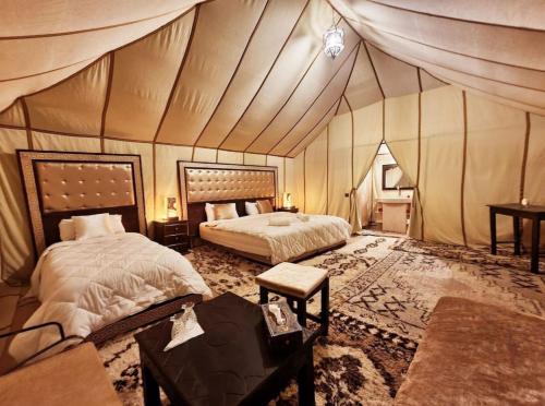 Lova arba lovos apgyvendinimo įstaigoje Opulent Sahara Camp