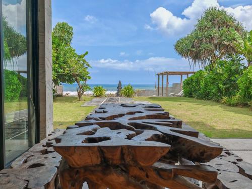 a row of rocks on the side of a building at Ketewel Beach Villas and Spa in Ketewel