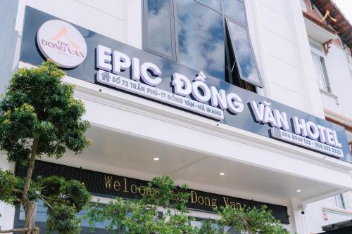 a sign on the side of a building at Epic Đồng Văn Hotel in Dồng Văn