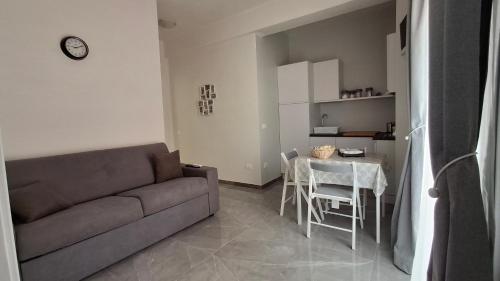 a living room with a couch and a table at Wanderlust in Sava