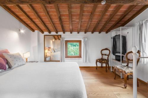 Postel nebo postele na pokoji v ubytování Vineyard’s Cottage With Pool, Ac, Wifi - Siena