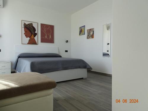 a bedroom with two beds in a room at Villa Eufemia in Parabita