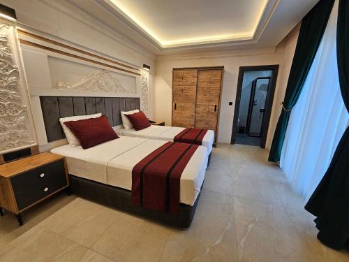 Ένα ή περισσότερα κρεβάτια σε δωμάτιο στο Baypark Hotel & SPA