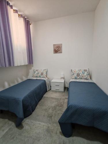Кровать или кровати в номере Residence la Pace - Pool & Relax