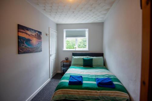 Säng eller sängar i ett rum på Eastfield House - Southampton