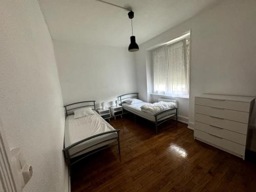 Llit o llits en una habitació de Appartement