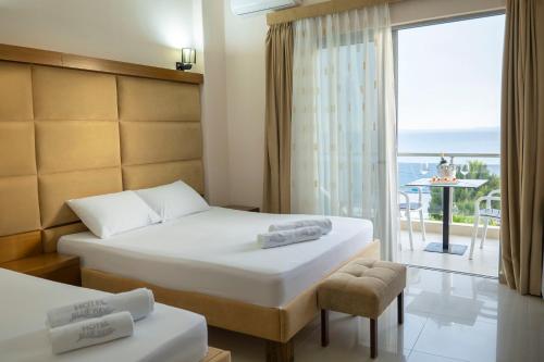 Postel nebo postele na pokoji v ubytování Hotel Blue Days