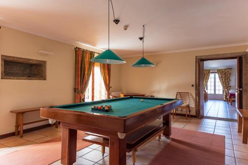 a billiard room with a pool table at Hotel Rural Quinta de Sao Sebastiao in Barroselas