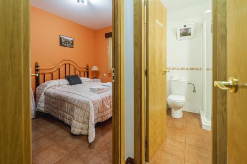 Giường trong phòng chung tại Valle De Juarros