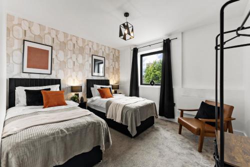 Ένα ή περισσότερα κρεβάτια σε δωμάτιο στο Stylish 2-Bedroom Flat in Norwich - Sleeps 6