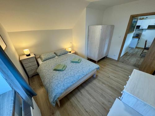 Apartmány Na Kopciにあるベッド