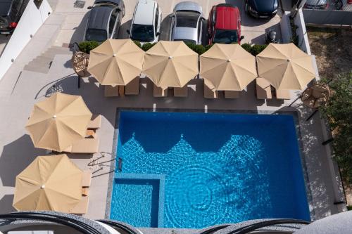 The swimming pool at or close to Monel Hotel