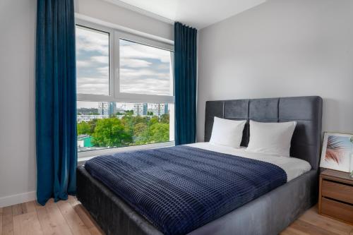 Postel nebo postele na pokoji v ubytování Pure Rental Premium Apartments - Free Parking & AC