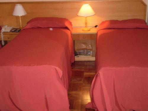 Katil atau katil-katil dalam bilik di Hotel Gravataí Center