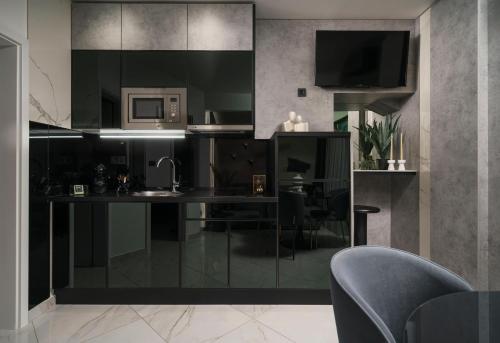 TV a/nebo společenská místnost v ubytování Apartments Antonia