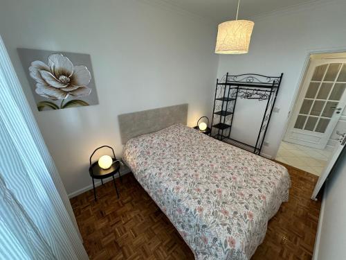 En eller flere senge i et værelse på apartamento da marginal