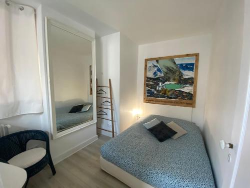 Letto o letti in una camera di L'académie de Clémence, Guest House Paris-Roland-Garros