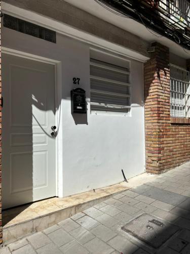 Apartamento blanco y negro en el centro