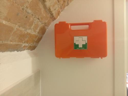 an orange electrical box on the wall of a room at Ca' D'Rosina in Narzole