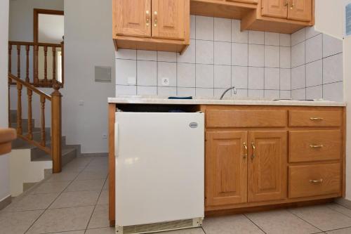 Kuchyň nebo kuchyňský kout v ubytování Golden Shell Murter