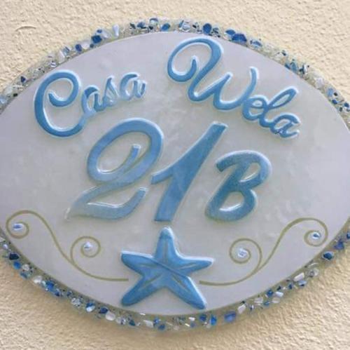 Certifikát, hodnocení, plakát nebo jiný dokument vystavený v ubytování casa Wela