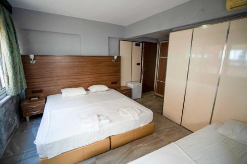 Imagen de la galería de Kutlugun Sahil Otel, en Akçay