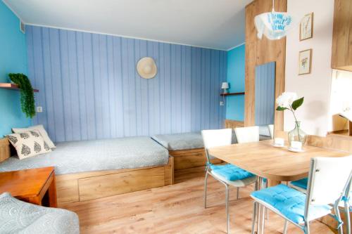 Χώρος καθιστικού στο Wynajem apartamentów i pokoi.