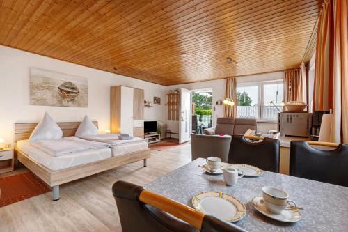 En eller flere senge i et værelse på Ferienhaus Landhaus Loose