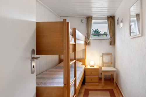 En eller flere senge i et værelse på Ferienwohnung Landhaus Loose