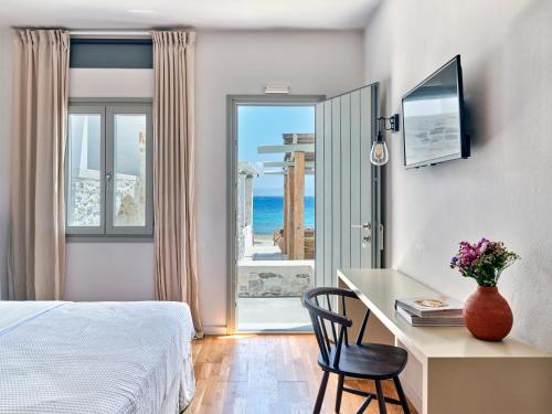 Postel nebo postele na pokoji v ubytování Magoo Suites