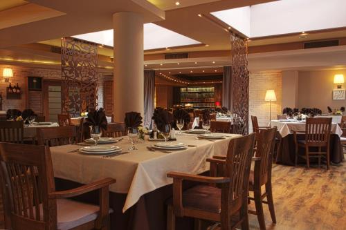 En restaurant eller et andet spisested på Triada Hotel