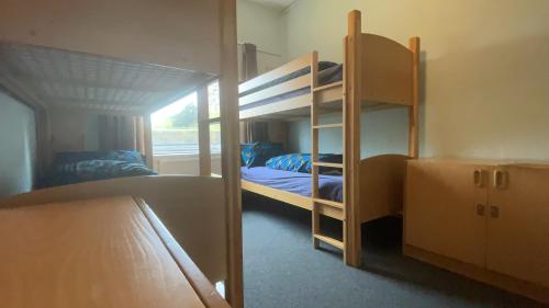 Postel nebo postele na pokoji v ubytování Stirling Youth Hostel