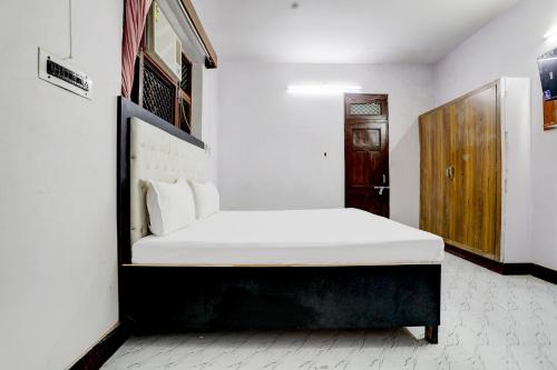 Posteľ alebo postele v izbe v ubytovaní OYO Hotel Star Galaxy