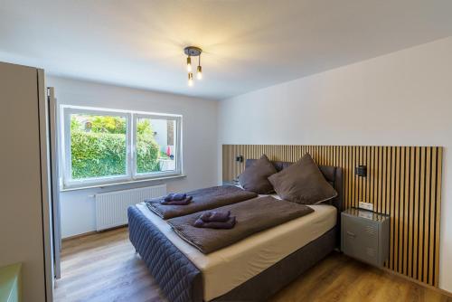 Ένα ή περισσότερα κρεβάτια σε δωμάτιο στο Pilea Apartments