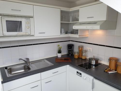 Dapur atau dapur kecil di Apartmenthaus Feuerbach