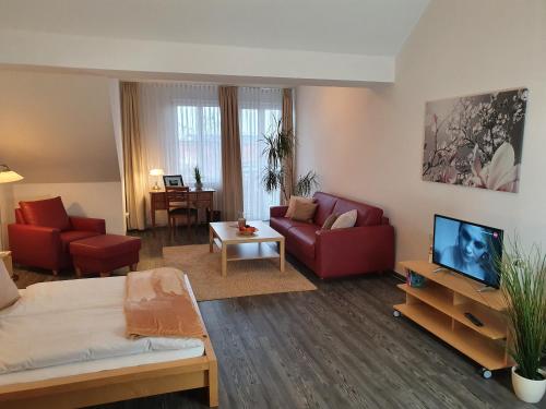 Televisyen dan/atau pusat hiburan di Apartmenthaus Feuerbach