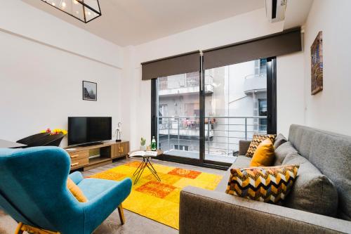 A television and/or entertainment centre at Kula apartments City center Exarchia