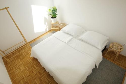 Postel nebo postele na pokoji v ubytování Quartier 27 - Apartment 60m2