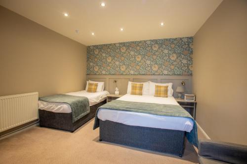- une chambre avec 2 lits dans l'établissement The Midland Hotel, à Leeds