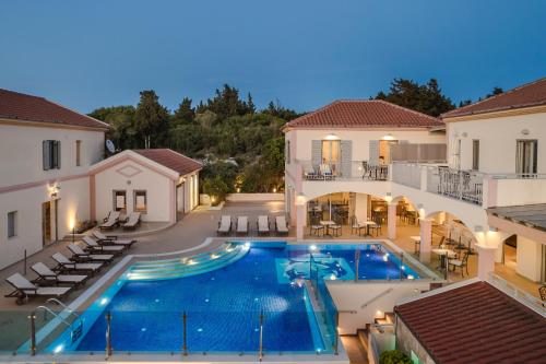 an image of a swimming pool in a villa at Belle View Hotel - Sea View & Sunset in Mánganos