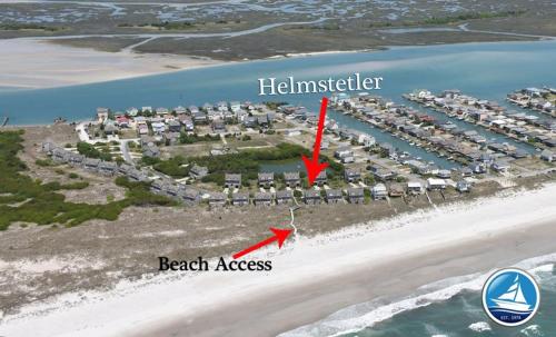 an aerial view of a resort on the beach at Helmstetler #3B in Topsail Beach