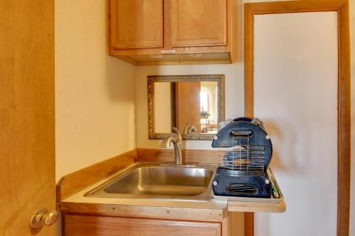 a kitchen with a mixer sitting on a sink at Yellowstone Country Retreat Stunning Views! in Livingston