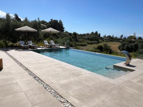 Gallery image of Elaiopetra Kefalonia - Stonehouse Hideaway with pool - Modern Luxury with Serene Sea and Mountain Views in Metaxáta