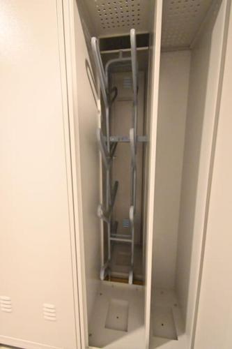 a walkin closet with a glass door with at Studio apartment 306 in Jahorina