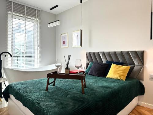 Ένα ή περισσότερα κρεβάτια σε δωμάτιο στο Mieszczańska 25 Apartment - Self check-in 20h - parking & lift