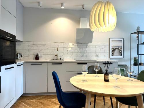 Η κουζίνα ή μικρή κουζίνα στο Mieszczańska 25 Apartment - Self check-in 20h - parking & lift