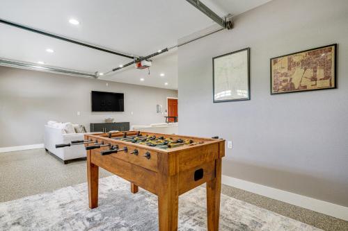 a living room with a foosball table in a room at Lakefront Vacation Rental about 10 Mi to Shipshewana! in Howe