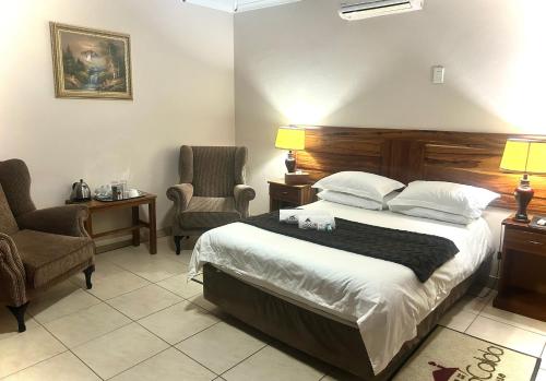 Ένα ή περισσότερα κρεβάτια σε δωμάτιο στο Casa Calida Guest House