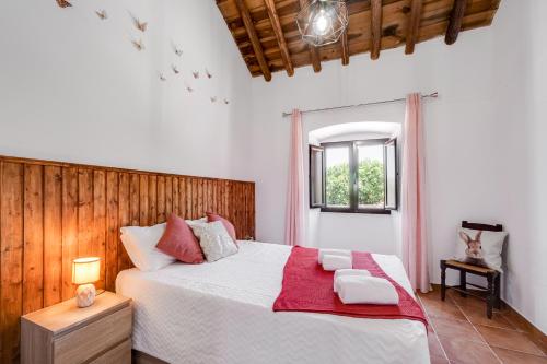 Postel nebo postele na pokoji v ubytování Casa do Ti Filipe - Praia Azenhas D El Rey