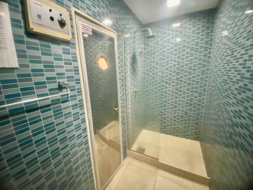 Ένα μπάνιο στο Apartamento Praia Piratininga Vista Mar